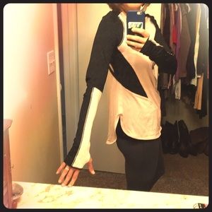 Light pink and black lululemon half zip